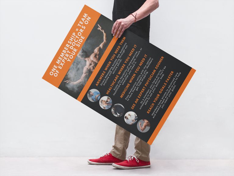 Phoenix Men's Health Center brochure held by a person